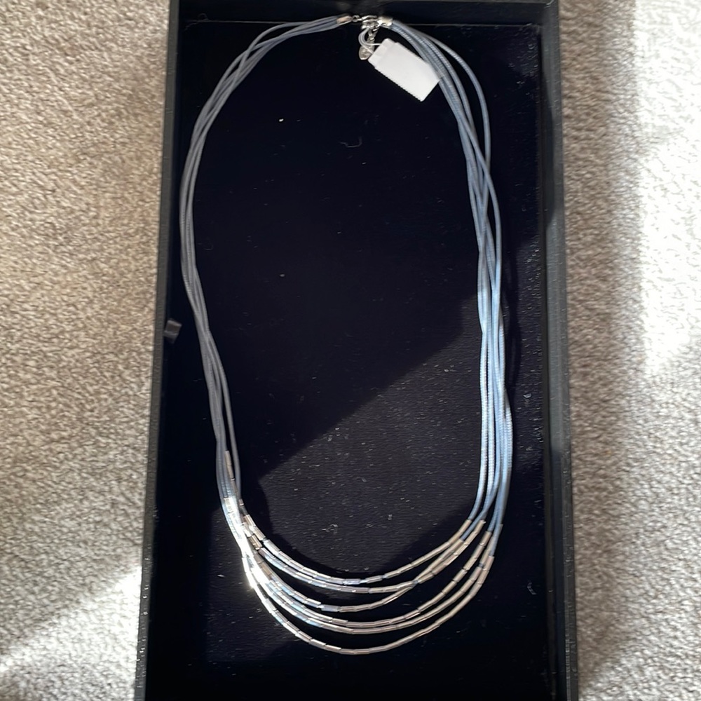 New multi strand gray cord and silver necklace